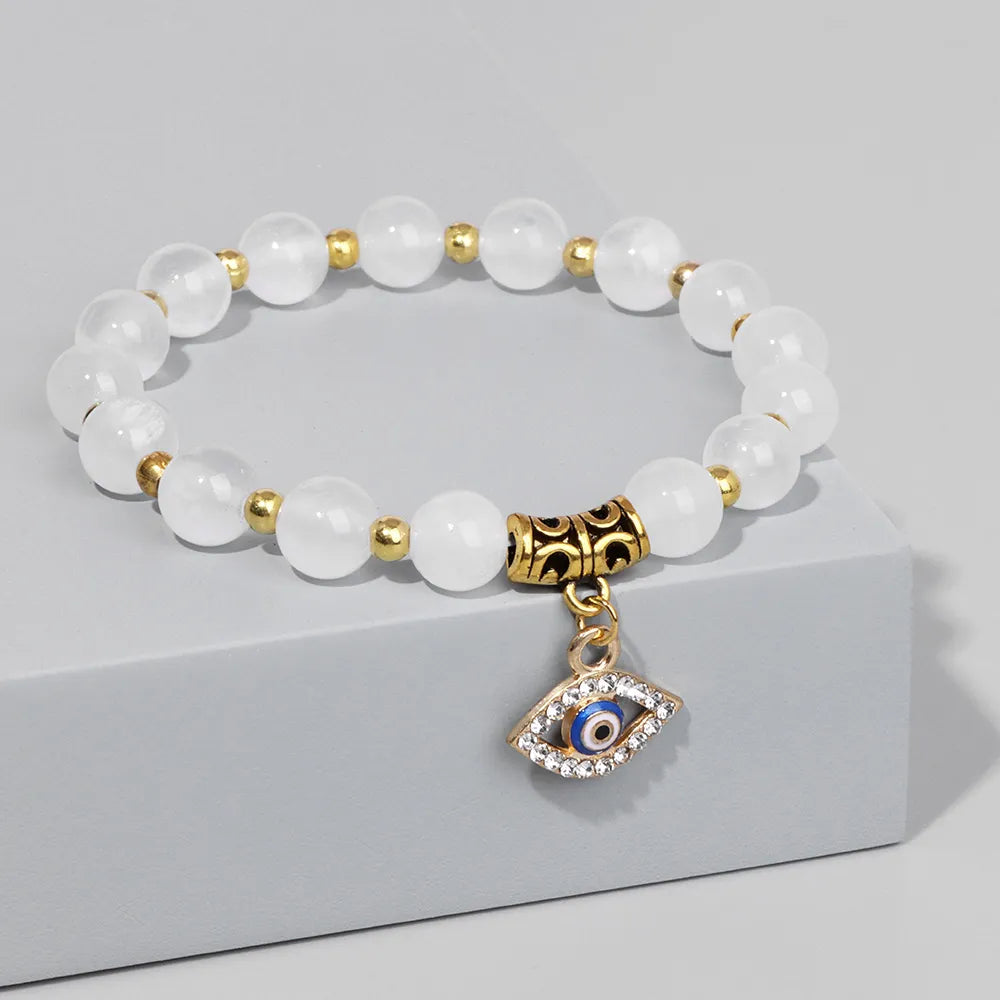 Bracelet femme pierre naturelle or, œil protecteur, yoga, guérison