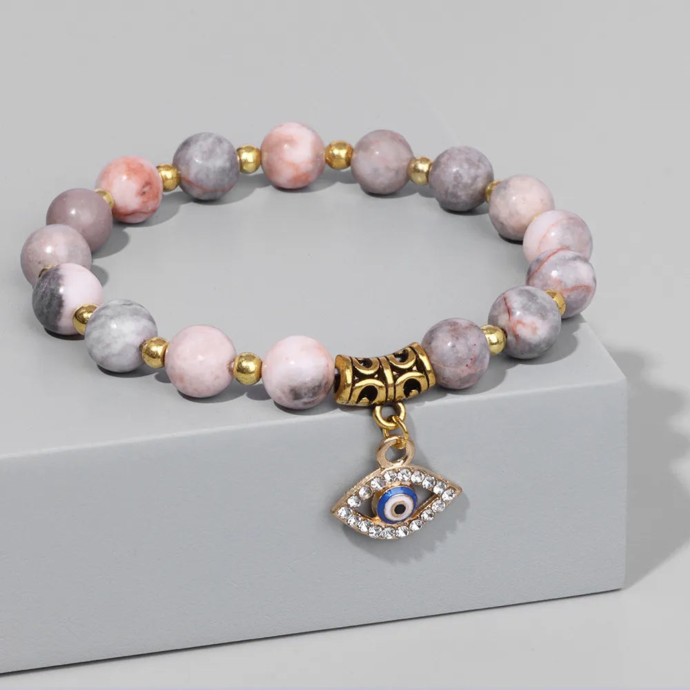 Bracelet femme pierre naturelle or, œil protecteur, yoga, guérison