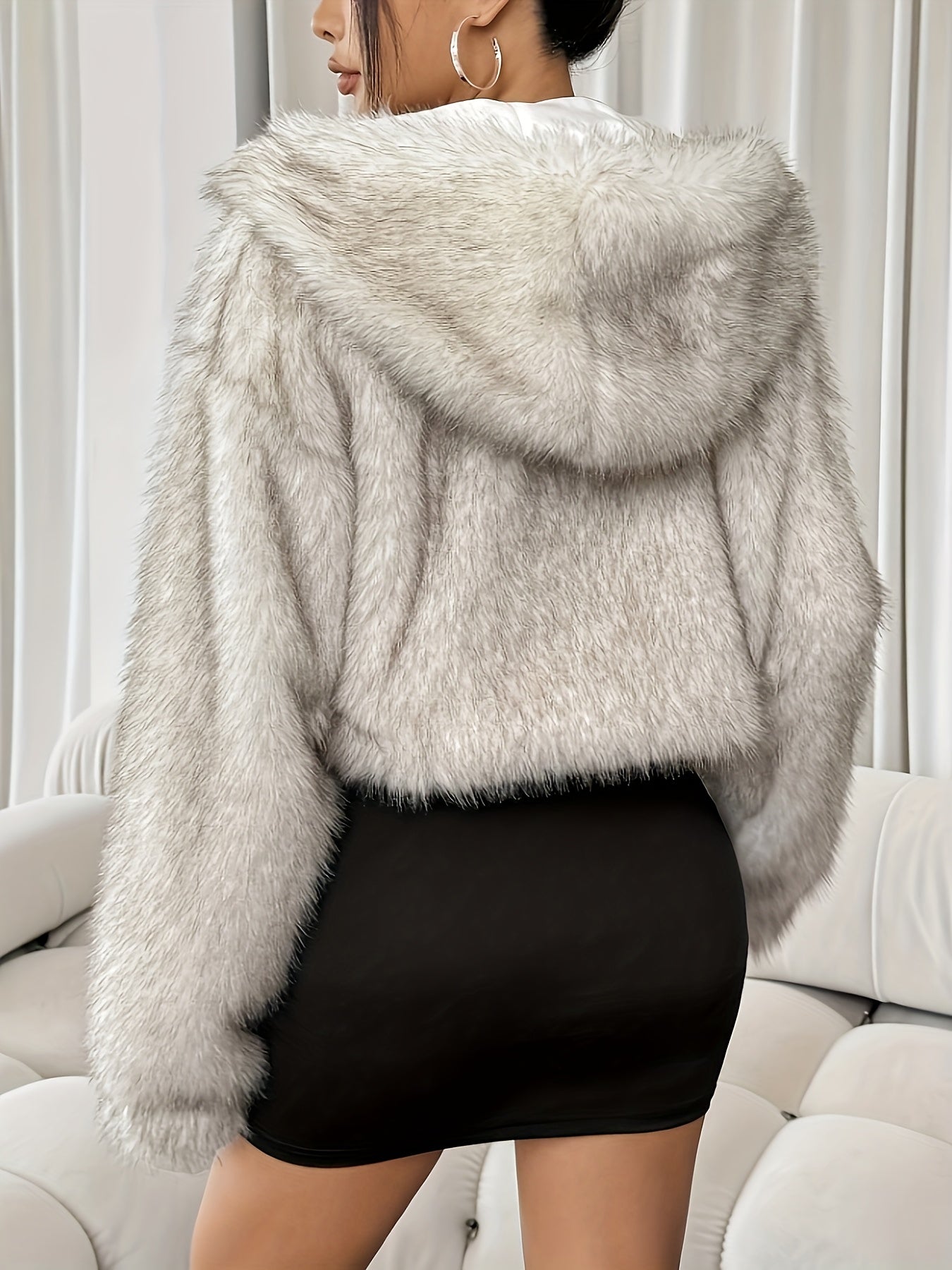 Veste femme chic à capuche – Chaude, élégante & tendance hiver