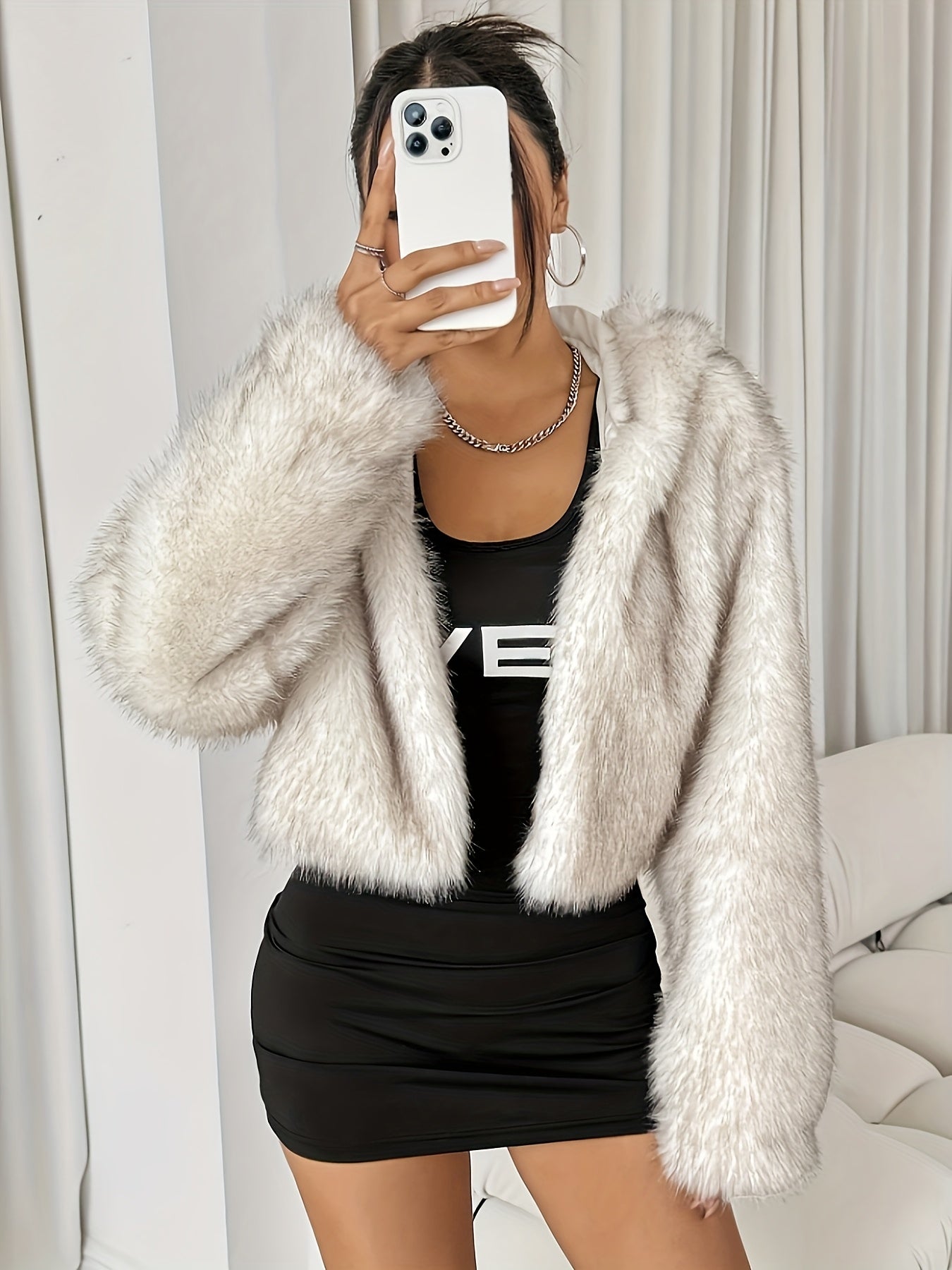 Veste femme chic à capuche – Chaude, élégante & tendance hiver