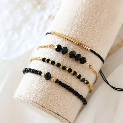 Bracelets Bohème Noirs 4pcs – Perles & Pierres Verre