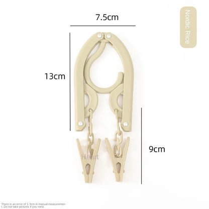Cintre de voyage pliable avec pinces – Léger et compact