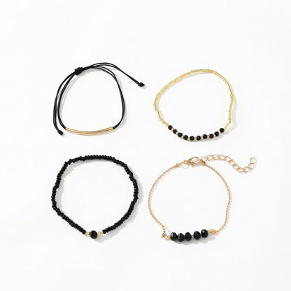 Bracelets Bohème Noirs 4pcs – Perles & Pierres Verre