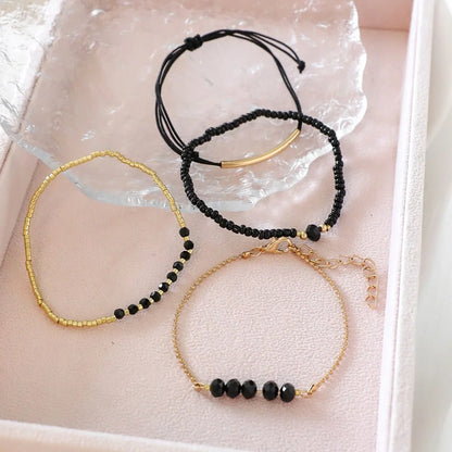 Bracelets Bohème Noirs 4pcs – Perles & Pierres Verre